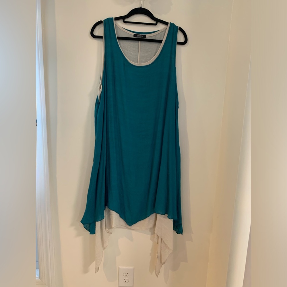 Adorn teal sleeveless tunic.